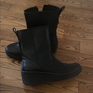 Sleek Black Leather Wedge Winter Boots